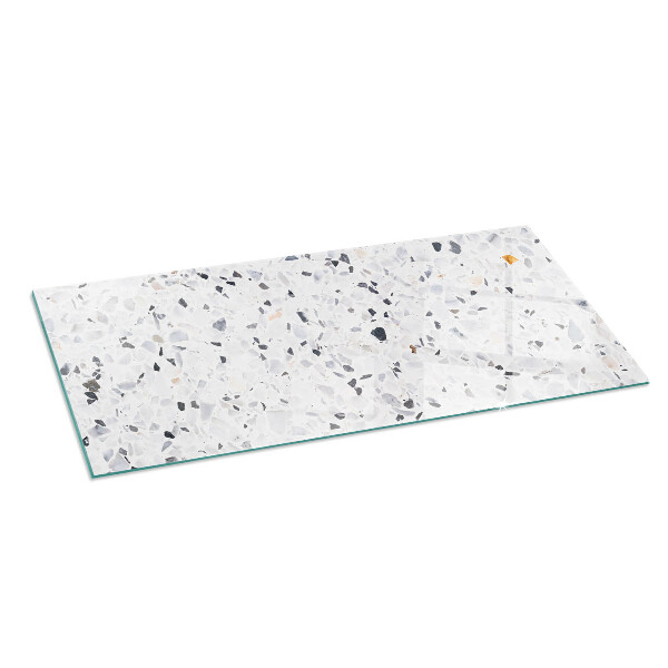 Rektangulär glasskiva under braskamin Stenmönster med små partiklar