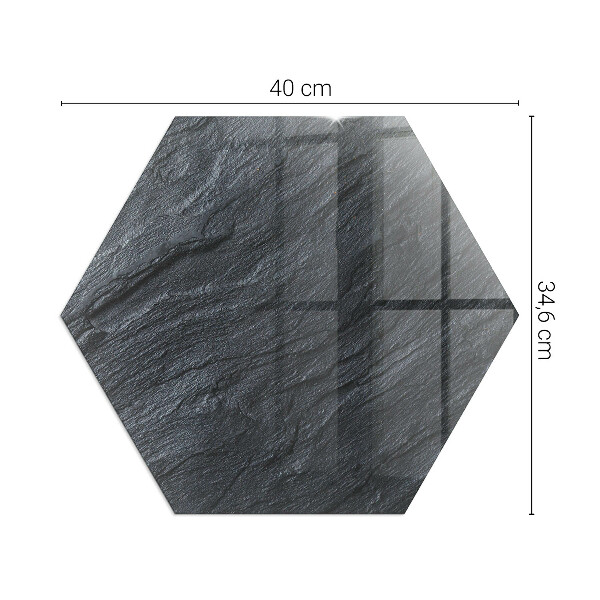 Sexhörning glasskiva under kamin Stenytans struktur